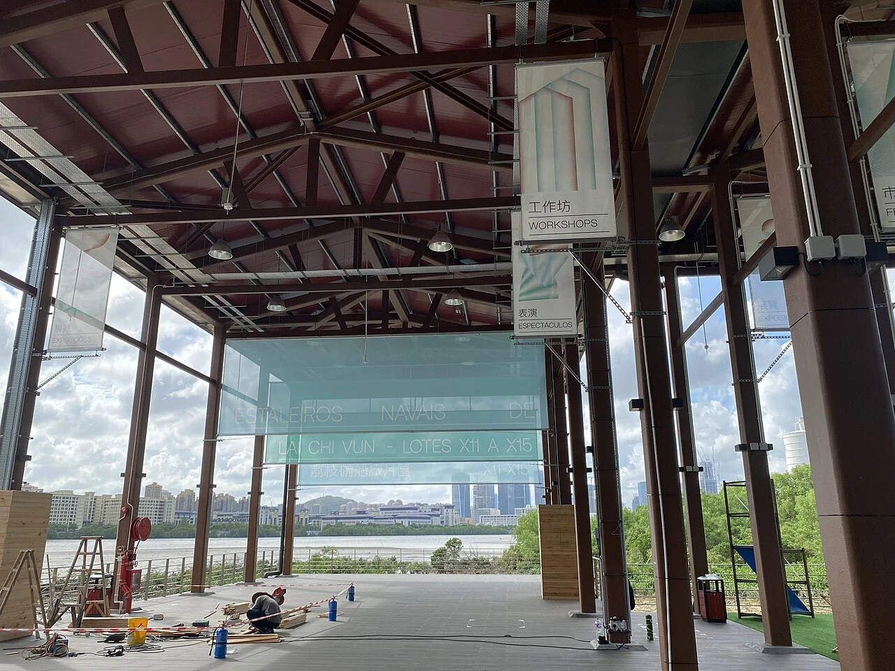 The open structures and waterside setting of the restored Lai Chi Vun shipyards.