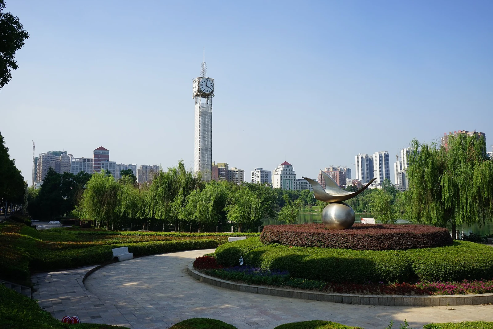 Daye: the Century Clock monument in Daye's civic park, a tall clock tower above the lake.