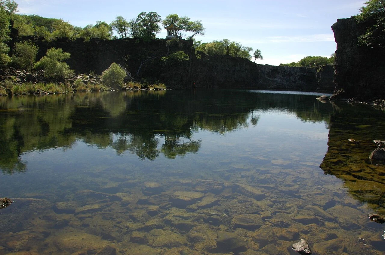 Rock and clear water at Jingpo Lake